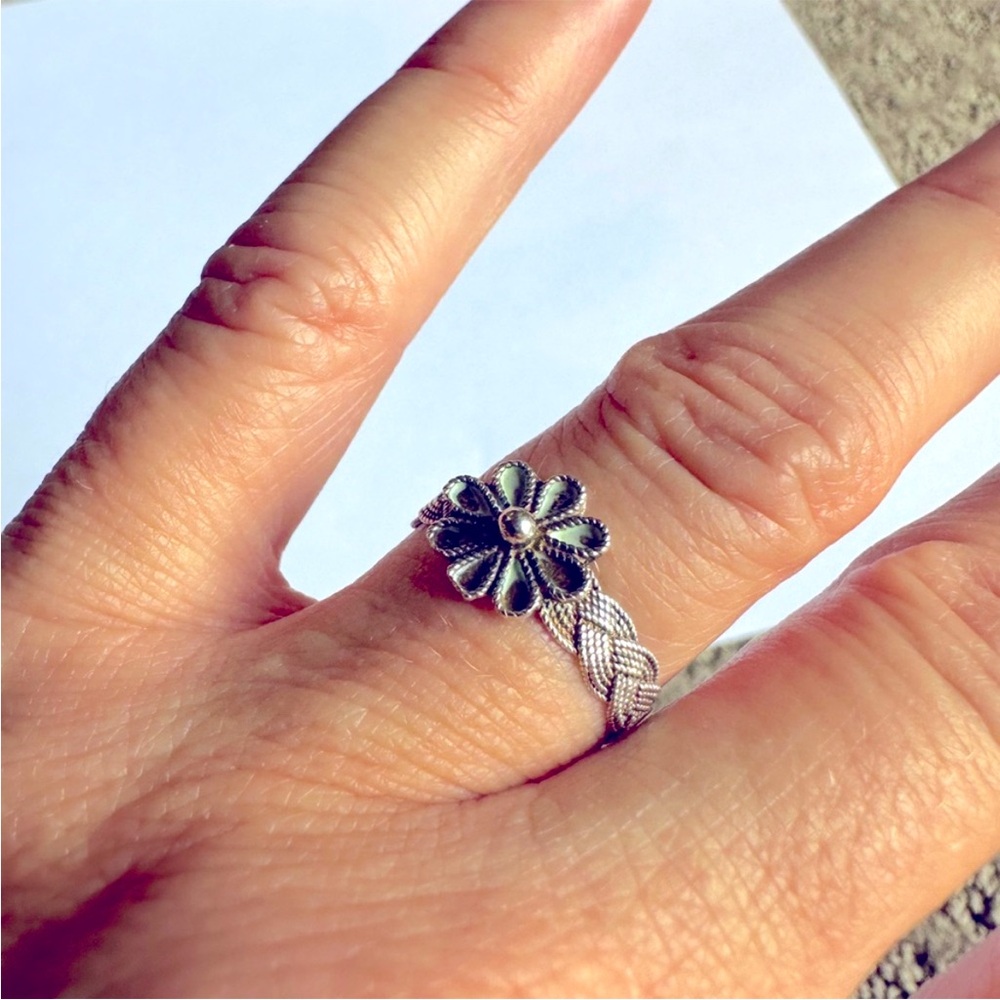 Sterling silver floral braided ring